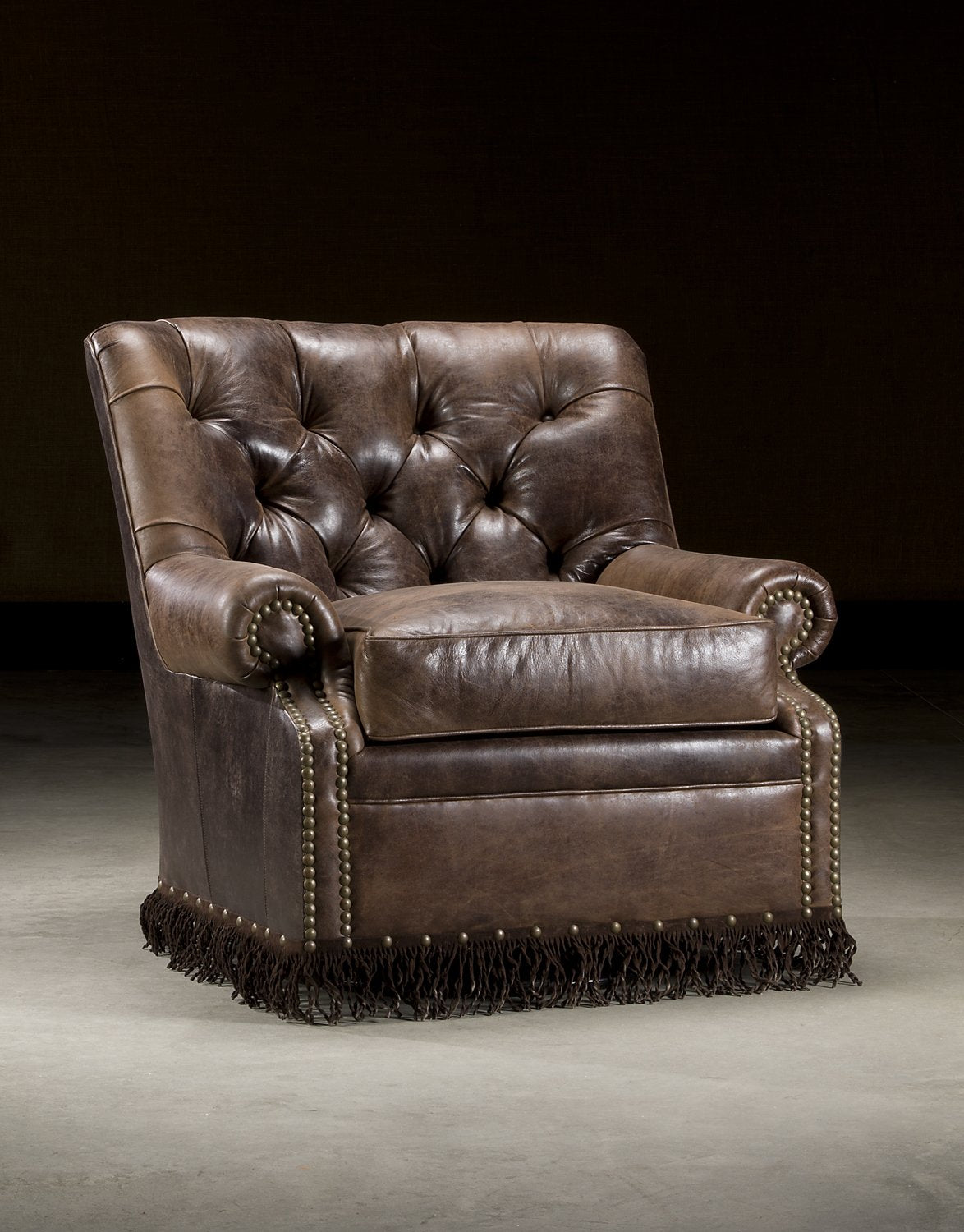 Randall  Antique Chocolate Swivel Glider with Fringe